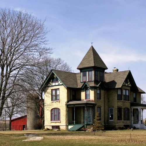 beautiful-shot-big-farmhouse-clear-blue-sky